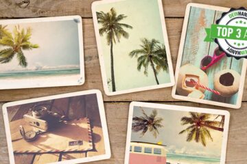 Postkarten-App: Fünf Postkarten auf einem Holztisch
